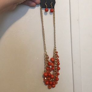 Orange and gold necklace with matching earrings